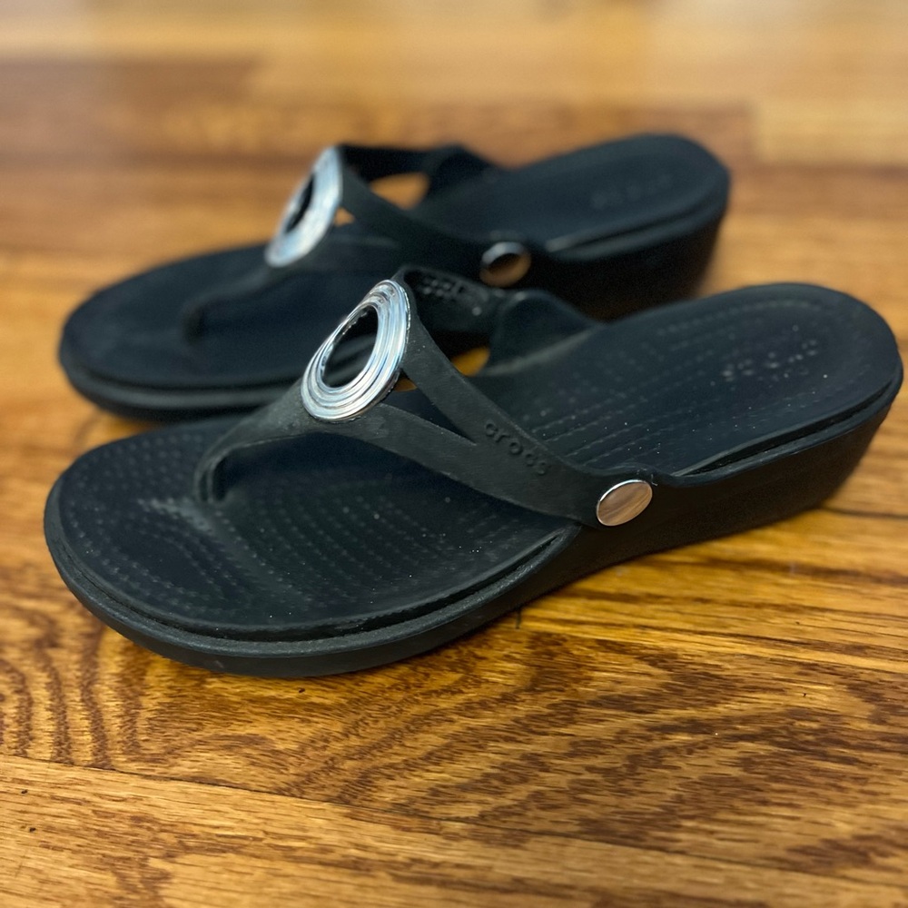 CROCS Black Wedge Sandals with Silver Accents